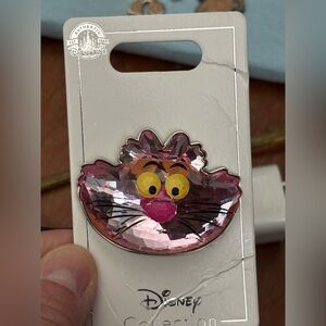 Disney Parks Cheshire Cat jeweled pin from Alice in Wonderland.